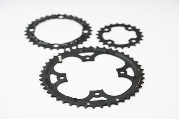 Gears, sprockets and chain of a mountain sports bike on a white background. Bicycle parts