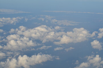 Fototapeta premium Clouds - view from plain travel