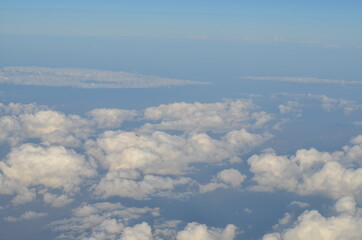 Fototapeta premium Clouds - view from plain travel