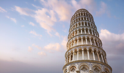 Pisa, Italy, a low angle view of the famous Leaning Tower of Pisa, at sunset, nobody