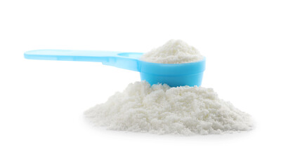 Powdered infant formula and scoop on white background. Baby milk