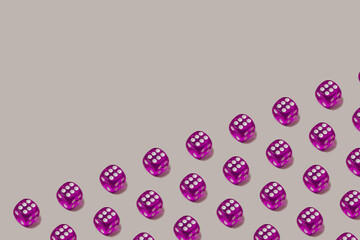 Trendy seamless pattern made with purple play dice on a pastel gray background. Lucky chance and gambling game backdrop.