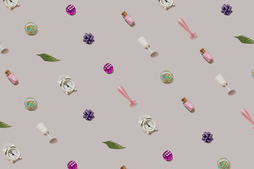 Trendy seamless pattern made with different Christmas and holiday objects on a pastel purple and gray background. Minimal celebration wallpaper backdrop.