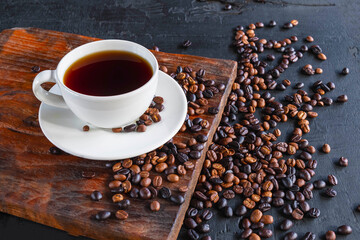 Cup of coffee and Roasted coffee beans
