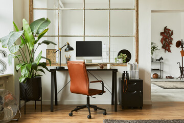 Stylish composition of modern masculine home office workspace interior design with black industrial...