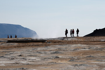 
Hverir, Iceland .Visitors admiring the geothermal, steaming volcanic pools of Hverir in Iceland...