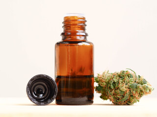 cannabis cbd oil bottle and medical marijuana hemp