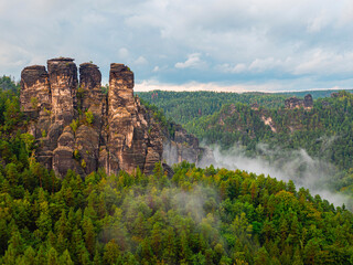 Bastei bridge, Saxon Switzerland National Park, Germany. traveling and travel goals for tourism. Travel and sights of city breaks. landmarks, travel guide and postcard.