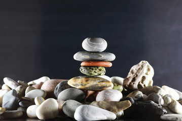 sea pebbles lined up in a pyramid