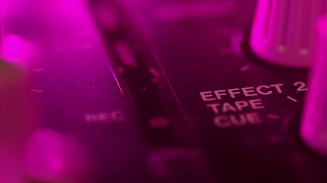 Portative cassette tape studio mixer. Sign Effect and blinking record LED light. Deep blur bokeh.