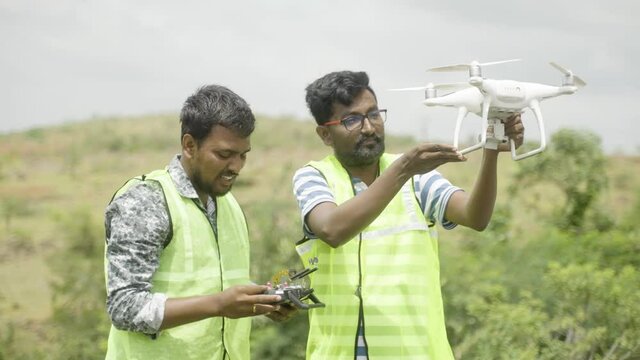 Trainer teaching by explaining about drone operations to student - Concept drone or UAV pilot training