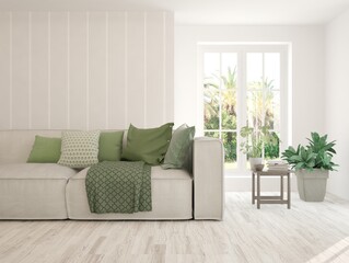 Stylish room in white color with sofa and summer landscape in window. Scandinavian interior design. 3D illustration