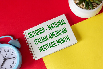 October - National Italian American Heritage Month, text on notepad and red and yellow background....