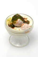 Dahi wada or dahi bhalla. This is delicious indian style food.