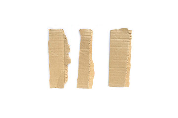 Recycled paper craft stick on a white background. Brown paper torn or ripped pieces of paper isolated on white background.