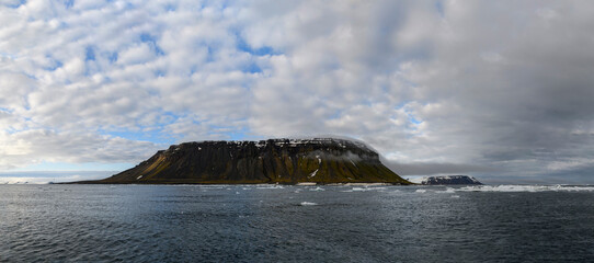 Arctic landscape in summer time. Franz Jozef Land archipelago. Flora cape, Gukera island.