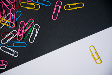 yellow paperclip broke away from the other collection