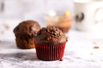 chocolate pancake on white background, red paper.