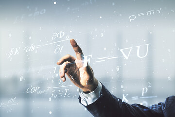 Man hand clicks on scientific formula illustration on blurred office background, science and...