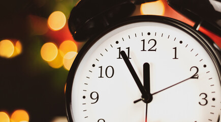 Fototapeta na wymiar The New Year's alarm clock shows midnight