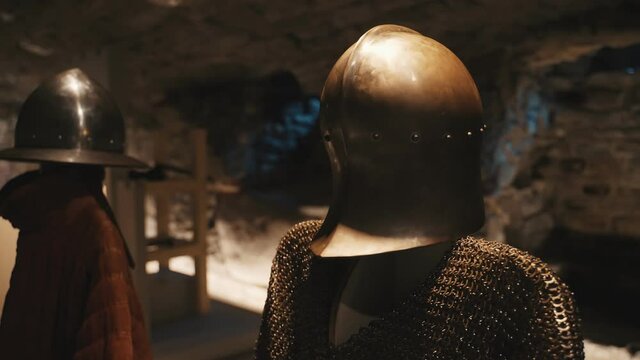 Medieval chain mail with a helmet in the museum.