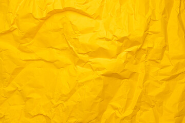Yellow paper texture background. Crumpled paper abstract shape background with space paper for text