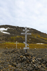 Old wooden cross. Franz Jozef Land archipelago. Flora cape, Gukera island. Sedov's expedition.