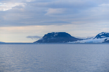 Arctic landscape in summer time. Franz Jozef Land archipelago. Flora cape, Gukera island.
