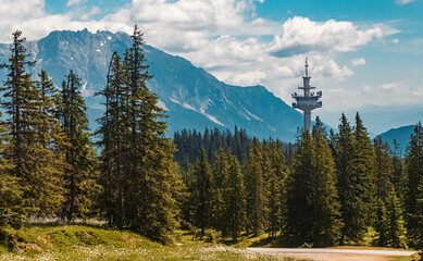 Beautiful alpine summer view with a TV transmission tower at the famous Rossbrand summit near Filzmoos, Salzburg, Austria