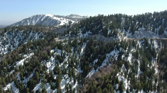 Winter Snow Forest Aerial Shot of San Bernardino Mountains Ski Trails Elevate California USA