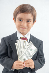Business Chid holding dollar notes 