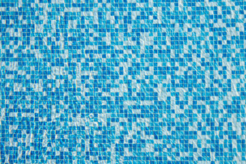 Abstract background of sparkling cool blue water in a swimming pool