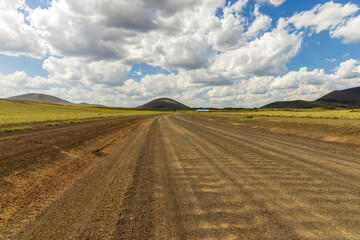 Fototapeta na wymiar Panorama picture of a dirt road in Arizona desert near Grand Falls, Flagstaff, Arizona
