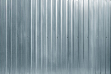 Gray corrugated metal fence.