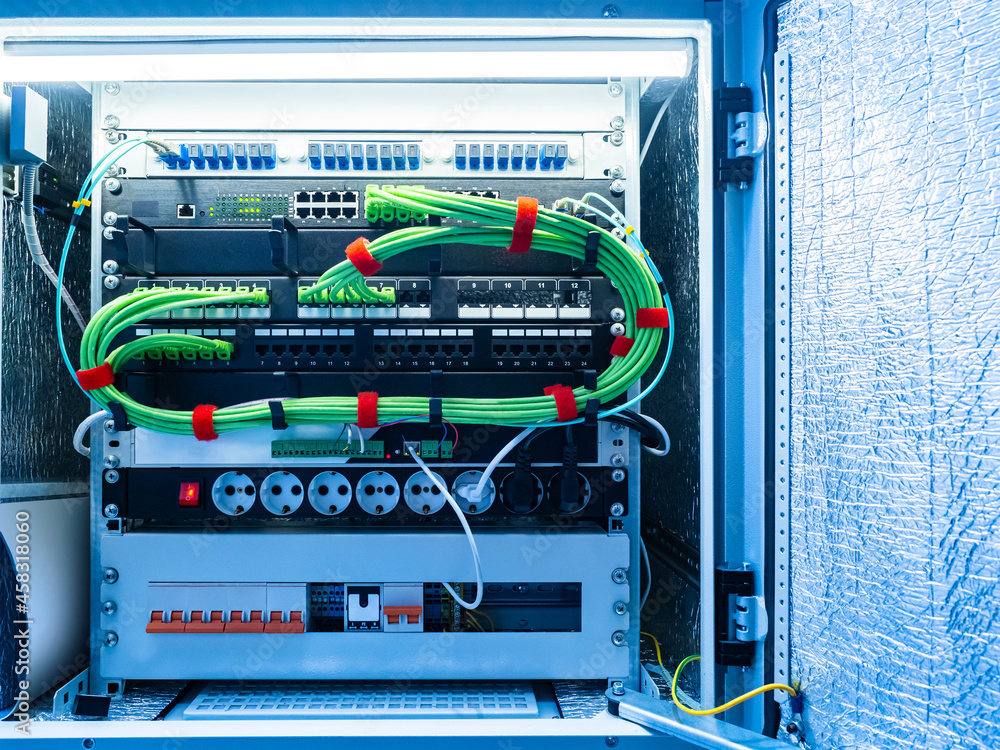 Poster patch panel close-up. structured cabling system. patch panel with wires. inside view of electrical c