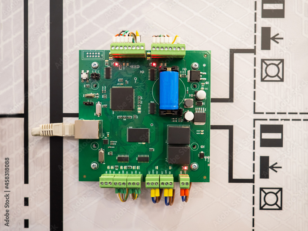 Poster electronic board. network cable is connected to pcb. green computer board. concept - testing of elec