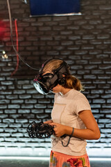 Online games in vr helmet in a computer club. Competitions in e-sports among youth.