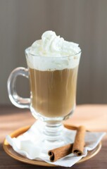 Closeup glass of coffee cappuccino sweet drinks cafe milk breakfast cinnamon caffeine beverage