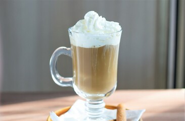 Closeup glass of coffee cappuccino sweet drinks cafe milk breakfast cinnamon caffeine