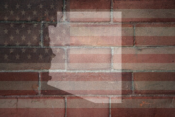 map of arizona state on a painted flag of united states of america on a brick wall