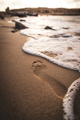 Fußabdrücke im Sand