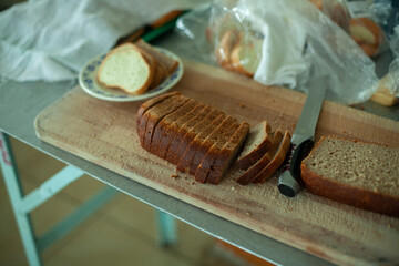 Sliced rye bread in the dining room. Food for lunch.