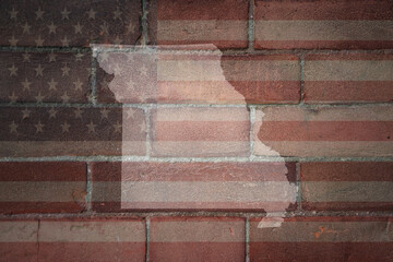 map of missouri state on a painted flag of united states of america on a brick wall