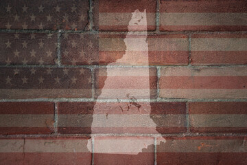 map of new hampshire state on a painted flag of united states of america on a brick wall