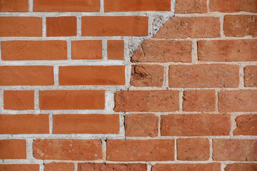 Texture of old and new red brick wall,   red brick wall background,   red brick wall backdrop, fixed brick wall