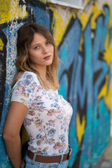 Natural Looking Young Beautiful Woman with Hazel eyes posing in abandoned building, no post editing