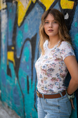 Natural Looking Young Beautiful Woman with Hazel eyes posing in abandoned building, no post editing