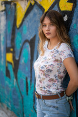 Fototapeta premium Natural Looking Young Beautiful Woman with Hazel eyes posing in abandoned building, no post editing