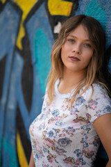 Fototapeta premium Natural Looking Young Beautiful Woman with Hazel eyes posing in abandoned building, no post editing