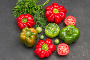 Red and green tomatoes and peppers